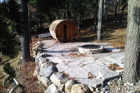 Natural-stone-landscaping-with-firepit-construction